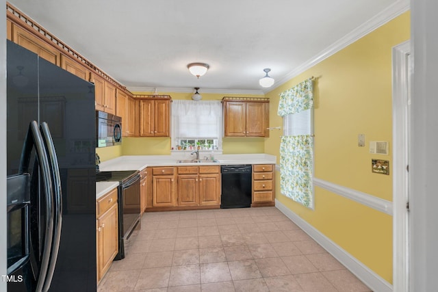 kitchen featuring black appliances, light tile patterned flooring, sink, and crown molding