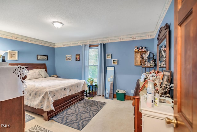 carpeted bedroom with a textured ceiling