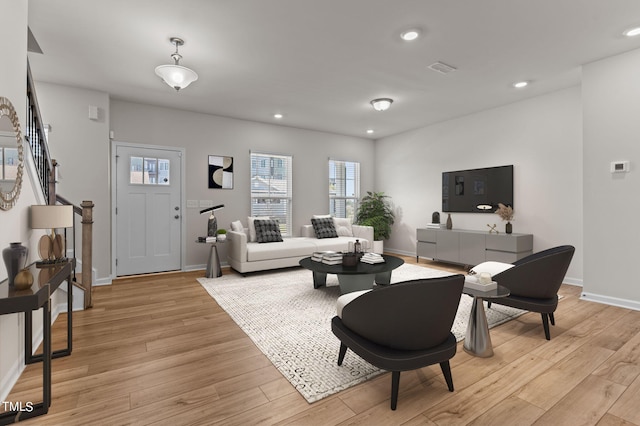 living room featuring light wood-type flooring