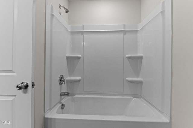 bathroom with shower / bathtub combination