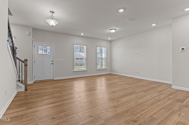 foyer entrance featuring light hardwood / wood-style floors