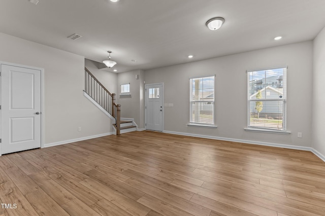 entrance foyer with light wood-type flooring