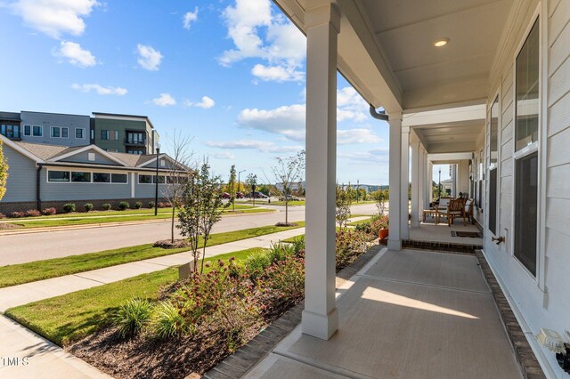 view of patio featuring a porch