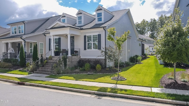 view of front of property with a front lawn