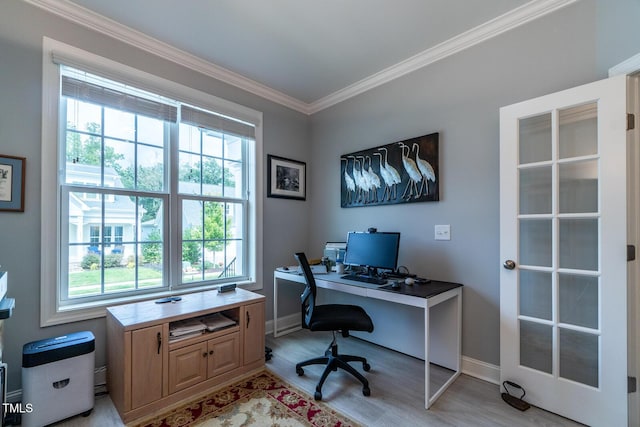 office featuring crown molding and light hardwood / wood-style flooring