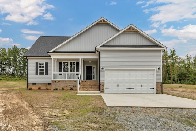 craftsman-style home with a porch and a garage