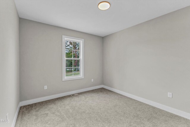 view of carpeted spare room