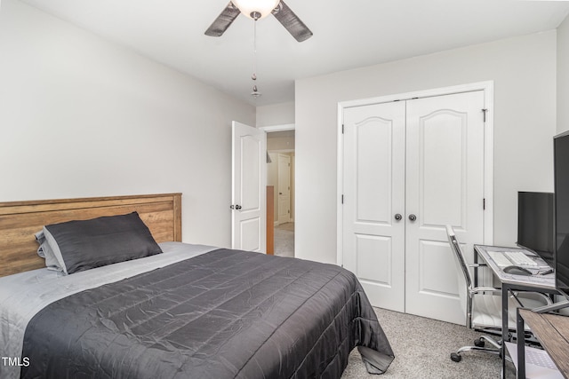 bedroom with ceiling fan, a closet, and carpet flooring