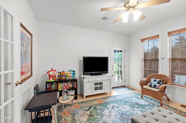 living room featuring ceiling fan