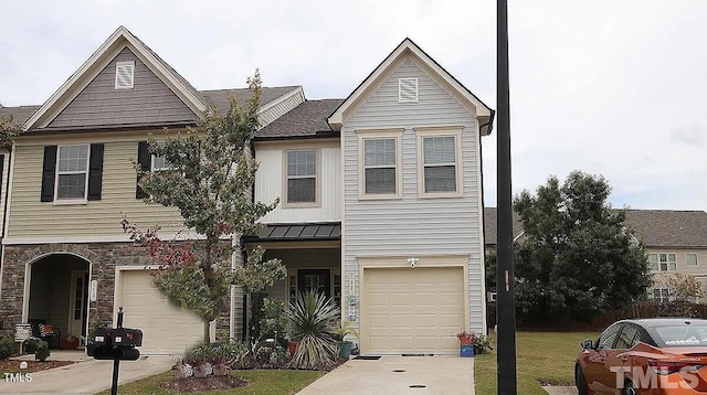 view of front facade with a front yard and a garage