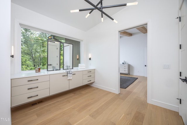 bathroom with vanity and hardwood / wood-style flooring