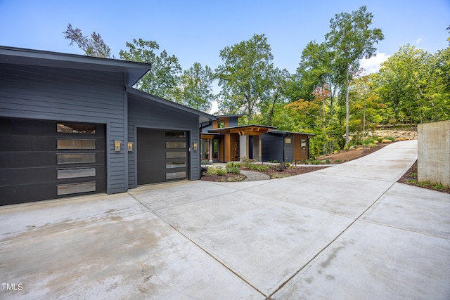 view of property exterior featuring a garage