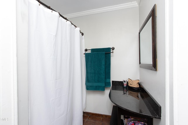 bathroom with tile patterned floors and crown molding