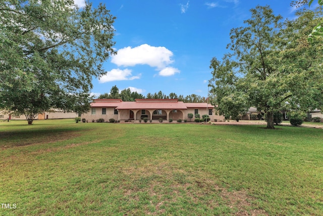 view of front of house with a front yard