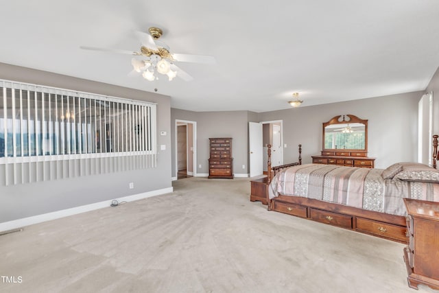 bedroom with ceiling fan and light colored carpet