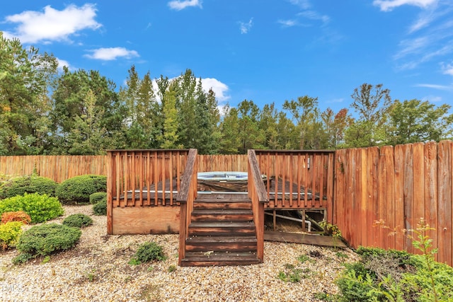 view of yard with a wooden deck