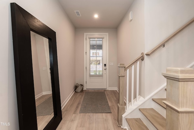 foyer entrance featuring light hardwood / wood-style floors