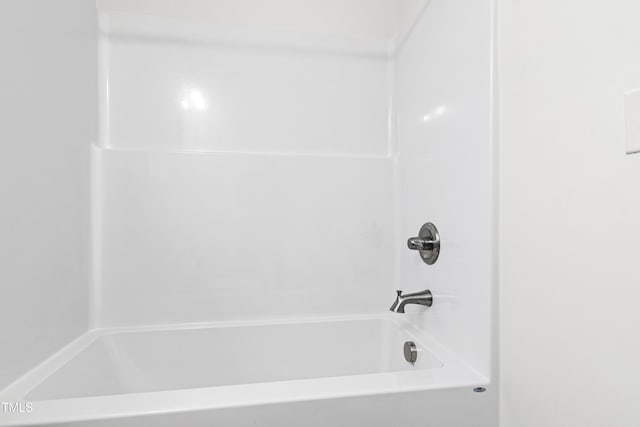 bathroom with shower / bathing tub combination