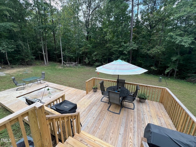 wooden deck with a yard