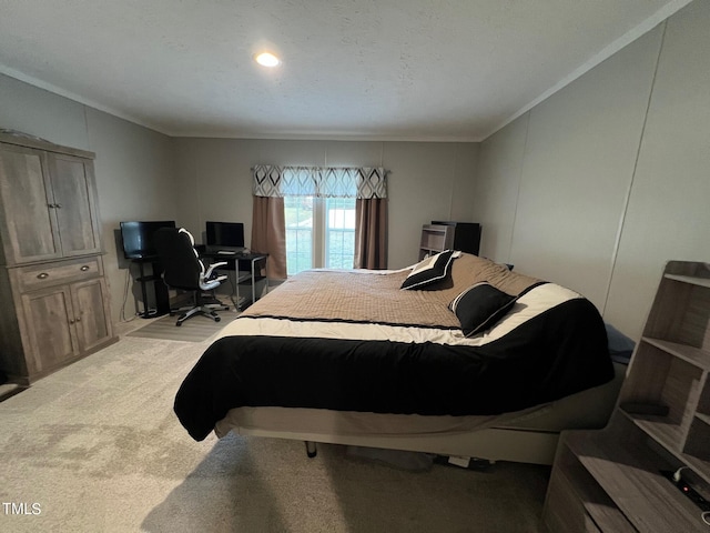 carpeted bedroom with a textured ceiling and crown molding