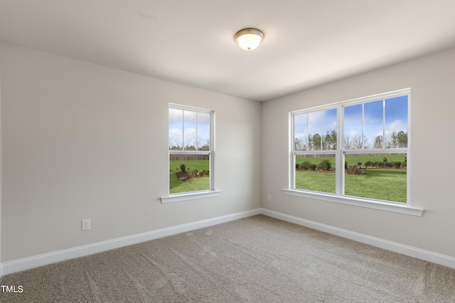 empty room with carpet flooring