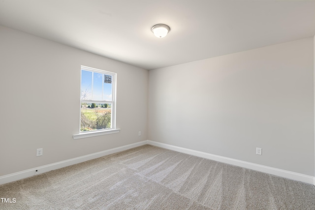 unfurnished room featuring carpet flooring