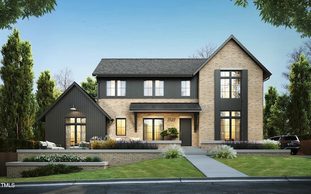 modern farmhouse style home featuring french doors, brick siding, and a front lawn