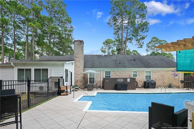 view of pool with a patio area, a grill, fence, and a fenced in pool