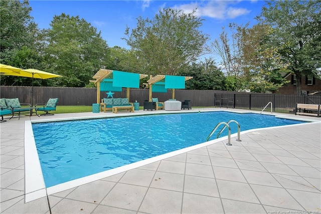 view of pool with a patio, fence, and a fenced in pool