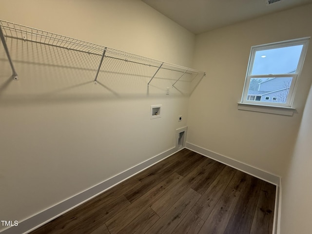 laundry room with hookup for a washing machine, dark wood-type flooring, and hookup for an electric dryer