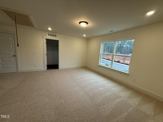 unfurnished room with carpet floors