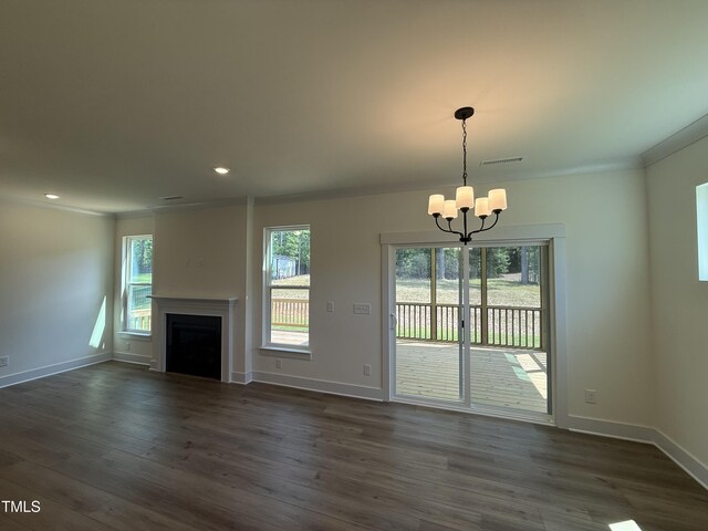 135 Green Haven Blvd Lot # 1, Youngsville, NC 27596 - unfurnished living room with a chandelier, crown molding, dark wood finished floors, baseboards, and recessed lighting