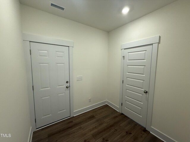 135 Green Haven Blvd Lot # 1, Youngsville, NC 27596 - foyer entrance featuring dark wood-type flooring and baseboards