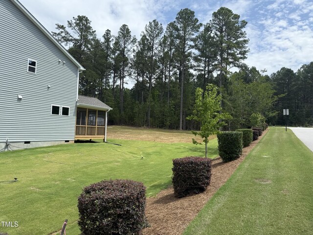 135 Green Haven Blvd Lot # 1, Youngsville, NC 27596 - view of green lawn featuring a sunroom