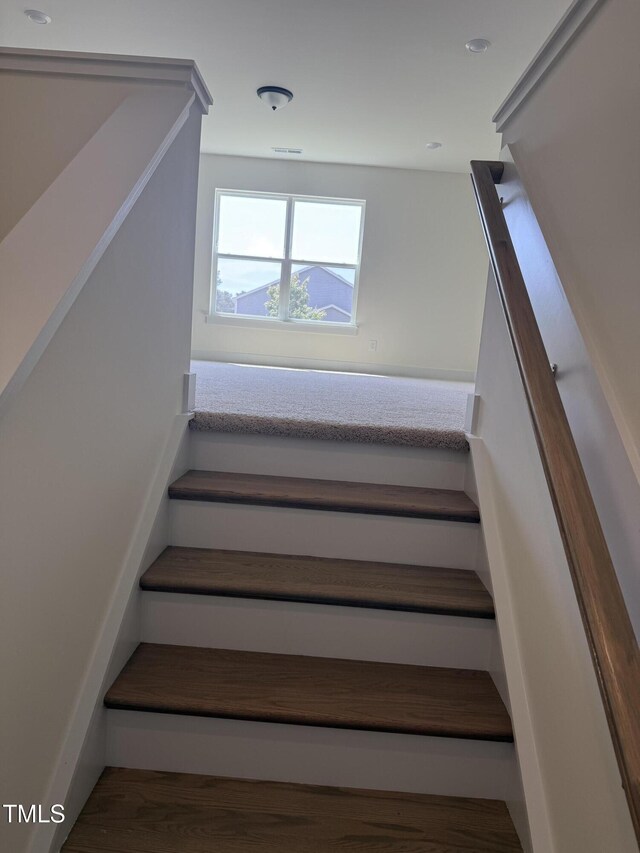 135 Green Haven Blvd Lot # 1, Youngsville, NC 27596 - staircase featuring wood finished floors