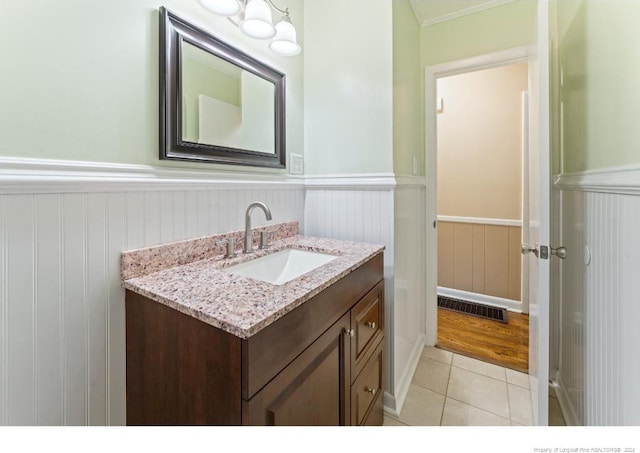 bathroom with hardwood / wood-style flooring and vanity