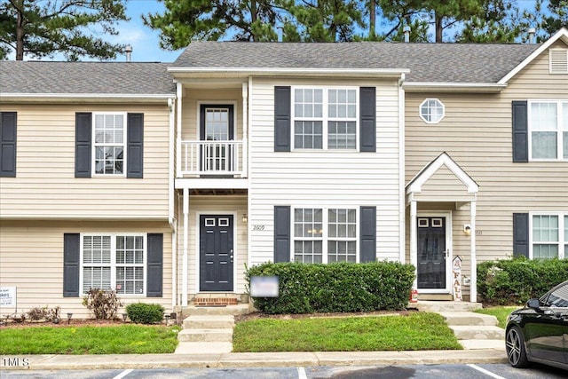 view of property with a balcony