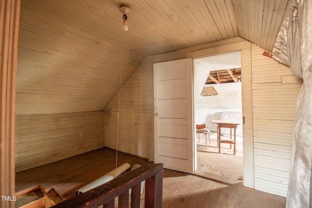 bonus room with wood ceiling, lofted ceiling, and hardwood / wood-style flooring