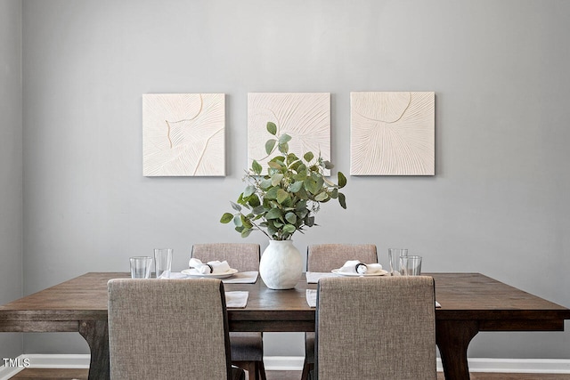 dining room with hardwood / wood-style floors