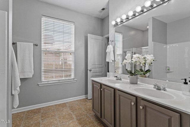 bathroom featuring vanity