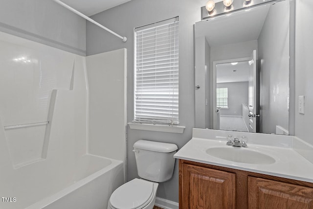 full bathroom featuring toilet, bathtub / shower combination, and vanity