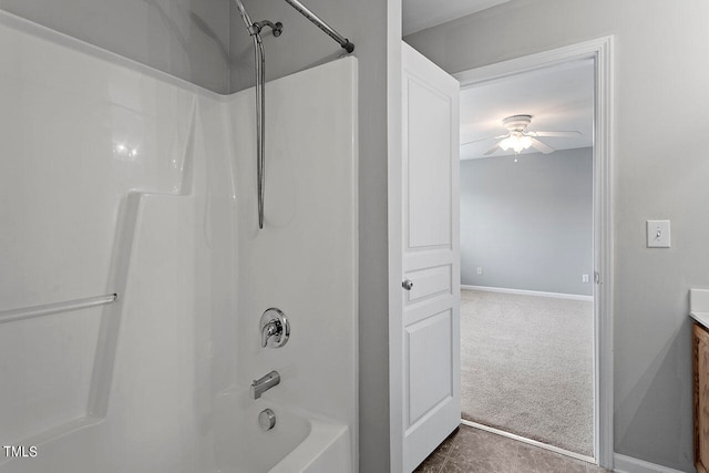 bathroom featuring vanity, ceiling fan, and shower / bathtub combination