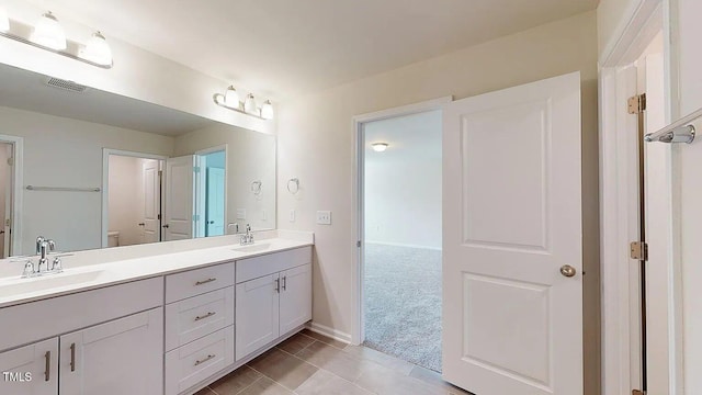 bathroom featuring vanity and tile patterned floors