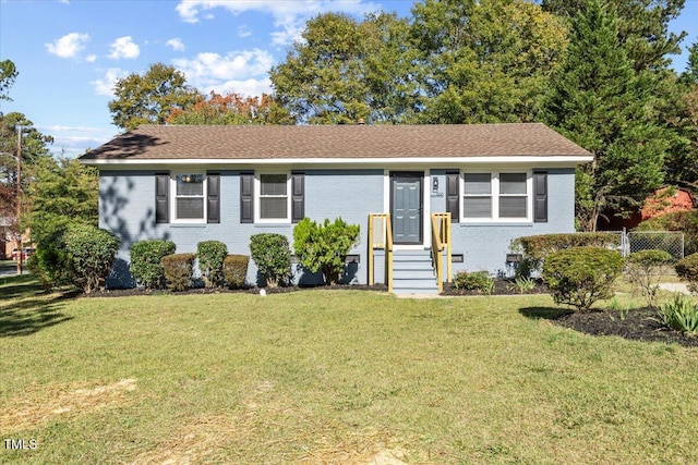 ranch-style house with a front yard