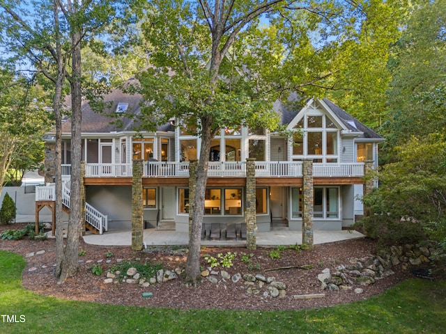 back of property with a patio area