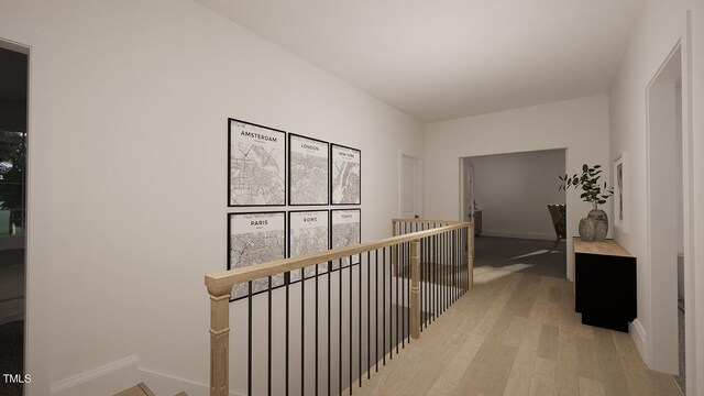 3301 Dell Dr, Raleigh, NC 27609 - hallway with baseboards, wood finished floors, and an upstairs landing