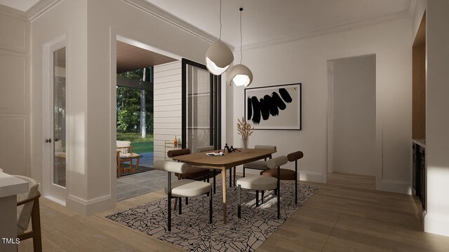 3301 Dell Dr, Raleigh, NC 27609 - dining space with wood finished floors, ornamental molding, and baseboards