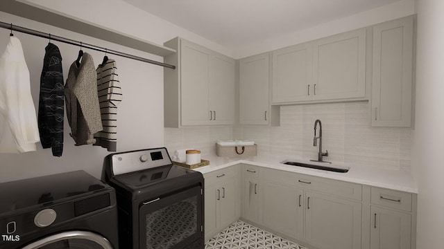 laundry room with sink and independent washer and dryer