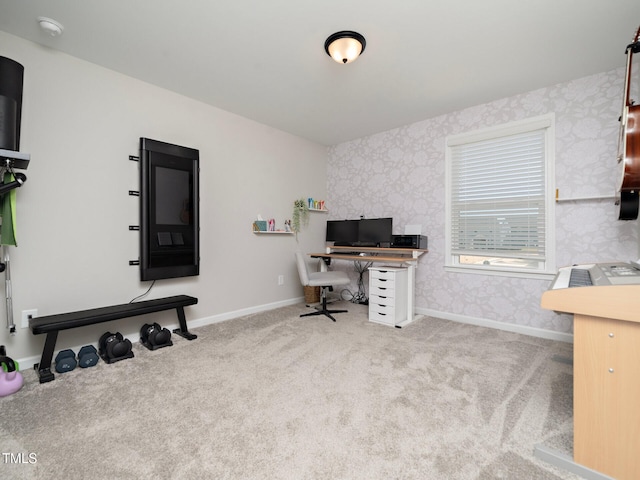 home office featuring baseboards, wallpapered walls, and light colored carpet