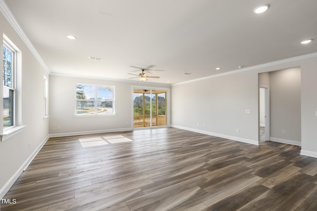 unfurnished room featuring ceiling fan, dark hardwood / wood-style floors, and crown molding